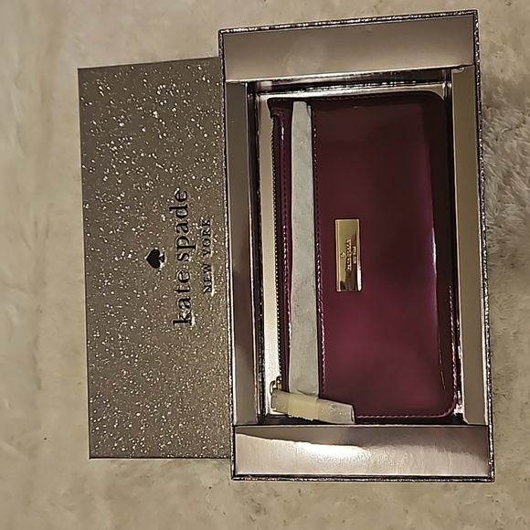 kate spade Handbags - NWT Kate Spade Kenzie Patent Dark Rasberry Slim Wallet/ Cardholder.